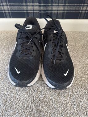 Nike Men’s Black Athletic Shoes with White Swoosh
